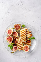 Grilled Halloumi Cheese, fresh figs fruit, almonds and honey