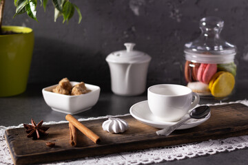 Empty cup of coffee on wooden board table background. Set of coffee and sweets food ingredient