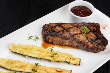 Grilled black angus steak New York