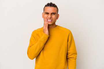 Young venezuelan man isolated on white background having a strong teeth pain, molar ache.