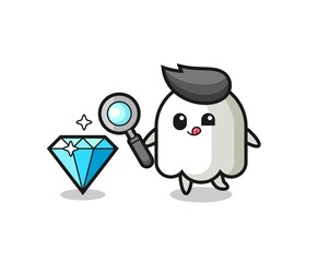 ghost mascot is checking the authenticity of a diamond