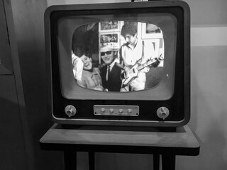 Retro tv with wooden table, black and white