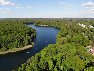 Fototapeta na wymiar Aerial view of Schlachtensee, the most southerly in the Grunewald chain of lakes, which belongs geologically to the Teltow plateau