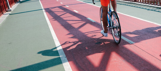 Bicycle red road on the pedestrian bridge. Close-up photo.