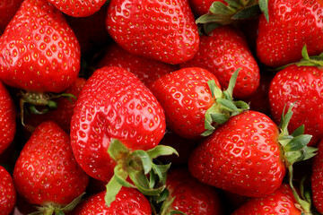 Fresh tasty strawberry on whole background, close up