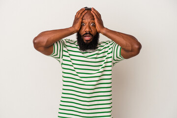 African american man with beard isolated on pink background screaming, very excited, passionate, satisfied with something.