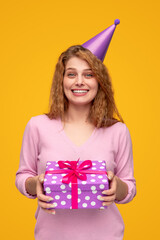 Delighted woman with birthday present