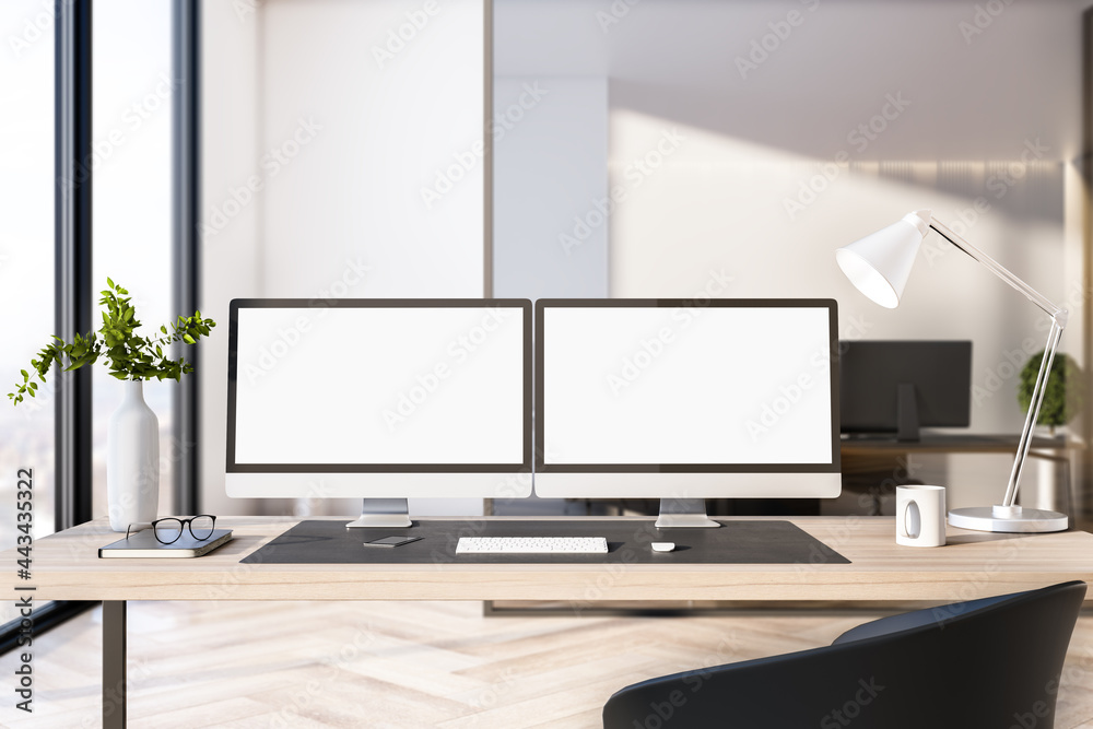 Poster Two empty white computer screens on office desktop in interior with daytime city view. Corporate template. Mock up, 3D Rendering.