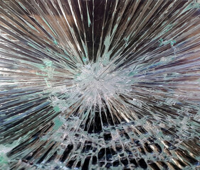 Broken glass showcase close-up, a lot of cracks