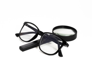 black glasses and magnifying glass isolated on white background. with clipping path.