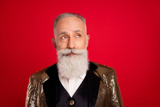 Photo Of Dreamy Charming Young Old Man Look Empty Space Wear Golden Costume Isolated On Red Color Background