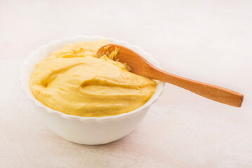 Polenta with white bowl and spoon