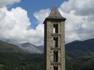 Naklejka premium UNESCO World Heritage. First Romanesque bell tower of the church in the village of Erill la Vall. (11-12 century). Valley of Boi. Spain.