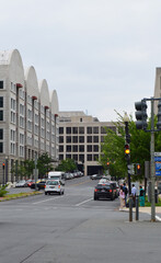 People crossing 3rd St NW in front of US Courthouse in Washington DC, USA