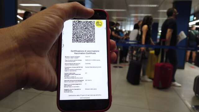 Europe, Italy , Linate Airport Milan, Green Pass European Eu Digital Covid-19 Certificate - tourists at the airport resume safe travel after vaccination