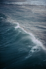 wave breaking on the beach