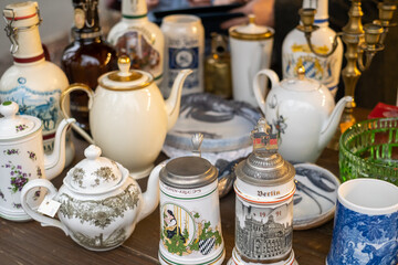 Assorted ceramic tableware on stall at bazaar