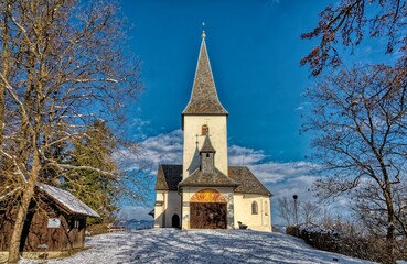 Fototapeta na wymiar Chapel in the woods in winter