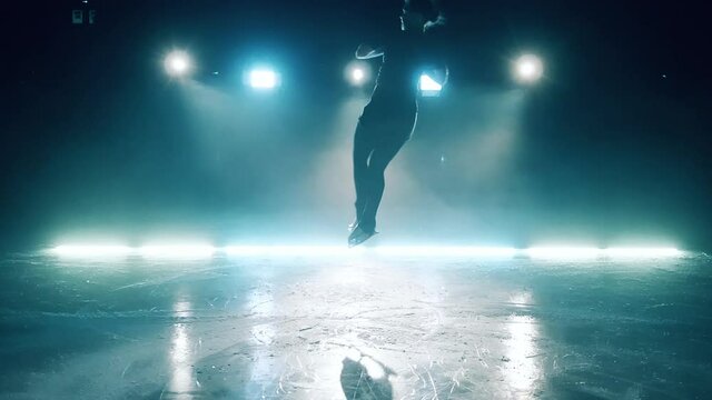 Single jump is being performed by a young girl while skating