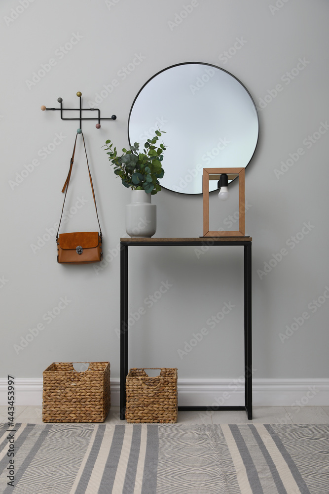 Wall mural light hallway with stylish console table and mirror. interior design