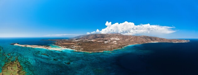 Panorama of whole Crete Island, Greece. Blue lagoon water and paradise beach of Elafonissi on the south-west coast of the island.