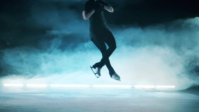 A girl is jumping while skating in slow motion