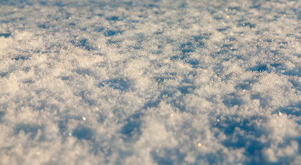 Snow drifts in winter - snow photographed in the winter season, which appeared after a snowfall. close-up,