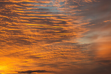 Fototapeta na wymiar Dramatic fiery bloody sky. Fantastic golden sunset.