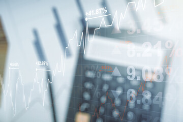 Double exposure of virtual creative financial diagram on calculator and papers background, banking...
