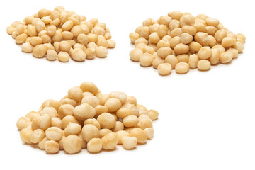 Macadamia nuts isolated on white background.