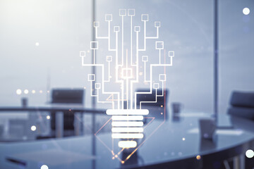 Double exposure of virtual creative light bulb hologram with chip on a modern meeting room background, idea and brainstorming concept