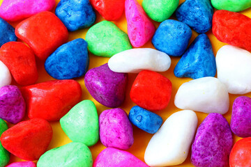 close-up colorful painted pebbles background