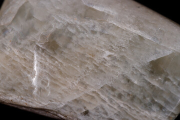 Macro mineral stone Moonstone on black background