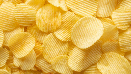 crispy golden potato chips snack texture background