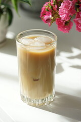 Iced coffee with ice in a tall glass