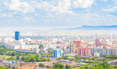 Fototapeta na wymiar Summer landscape of Krasnoyarsk city. Cityscape with modern apartment buildings