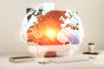 Double exposure of abstract digital world map on laptop background, research and strategy concept