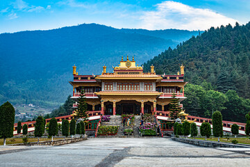 buddhist monastery at himalayan mountain foothills at morning from flat angle