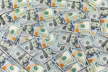 Texture with US dollars. Background of one hundred dollars bills.