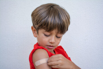 Vaccination.
Small Boy After Getting Vaccine