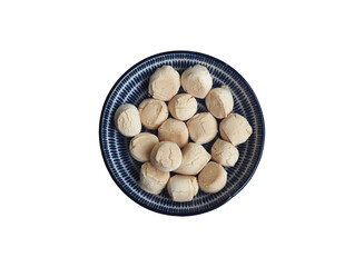 Top View of Thai Sweetmeat made of flour, egg and sugar, in White and Blue Rounded Ceramic Cup, isolated on white background. For traditional Thai Pastry or Thai snack concept.