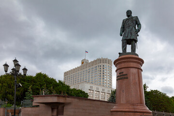 Fototapeta premium Monument to Stolypin in Moscow near the Government House. On the pedestal there is an inscription in Russian, translated into English meaning Pyotr Arkadyevich Stolypin