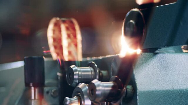 Close up of an old tape moving through a film projector