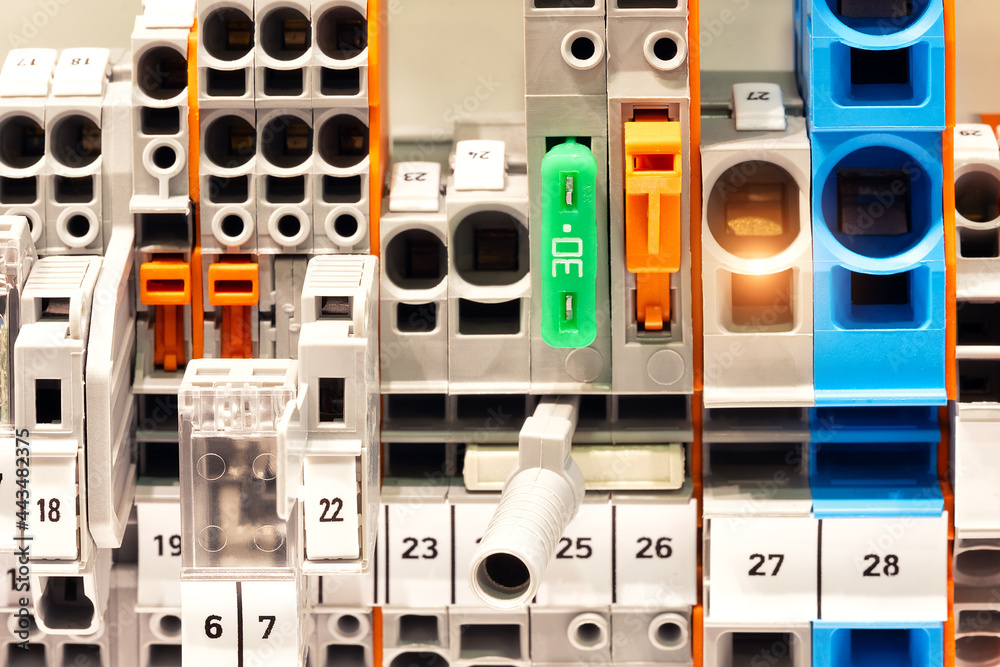 Poster View of communication port module on PLC unit in control box of automation machine