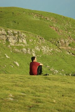Candid shot a young male model enjoying the beauty of nature