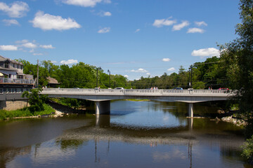 Fototapeta na wymiar Bridge over a still river