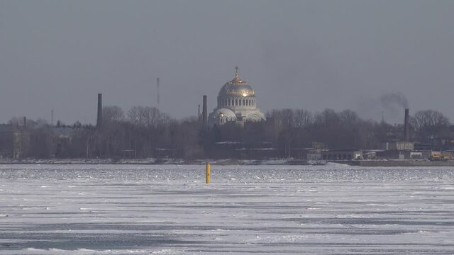 Kronstadt Naval Cathedral on island near Saint-Petersburg. At winter. Ice in Guld of Finland. High quality 4k footage