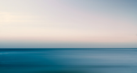 Obraz premium background of sea and sky at sunset with long exposure - minimalist backgrounds
