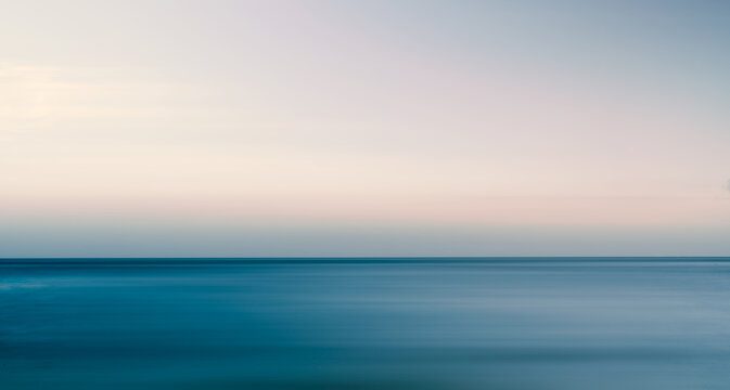 background of sea and sky at sunset with long exposure - minimalist backgrounds