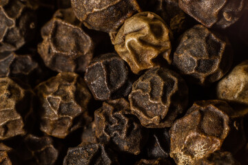 closeup of black and red peppercorns. macro photography. Spices for cooking food.